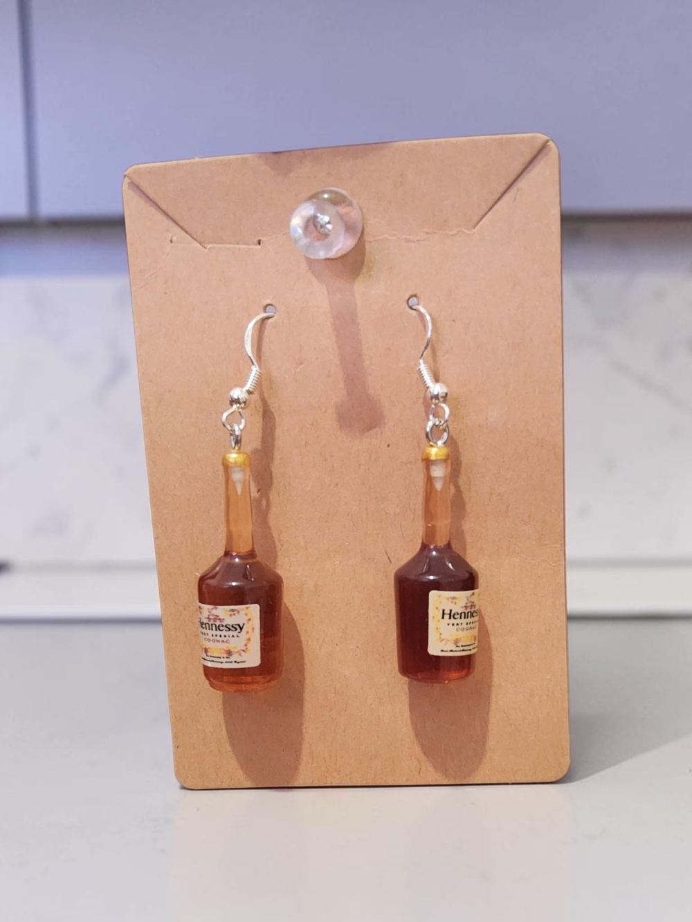 10 / $10 Henne Mini Bottle Drop Earrings in Brown and Gold